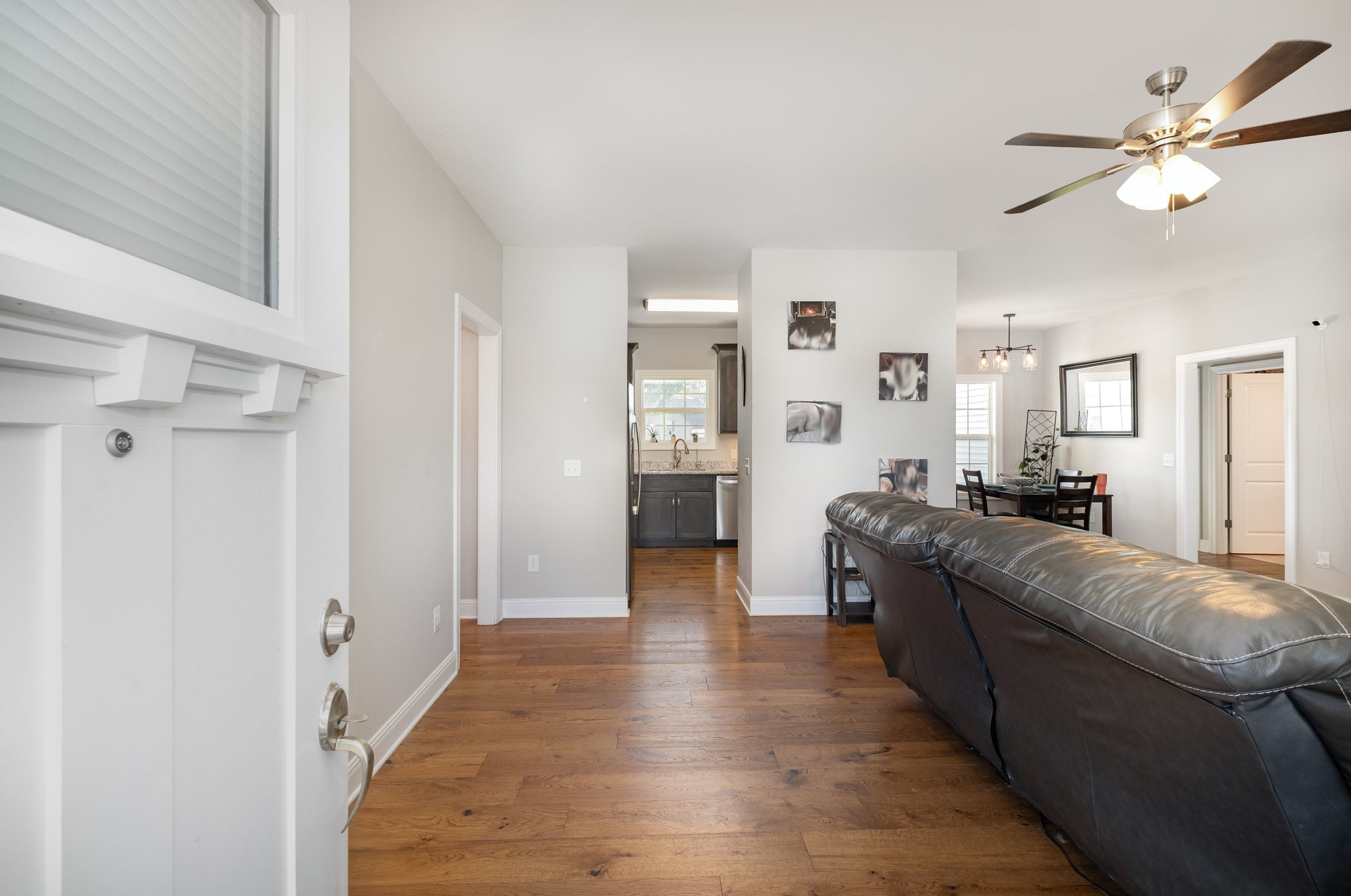 8903 Covington Road White House, TN 37188 - Photo 8 of 36 a living room with furniture and a wooden floor