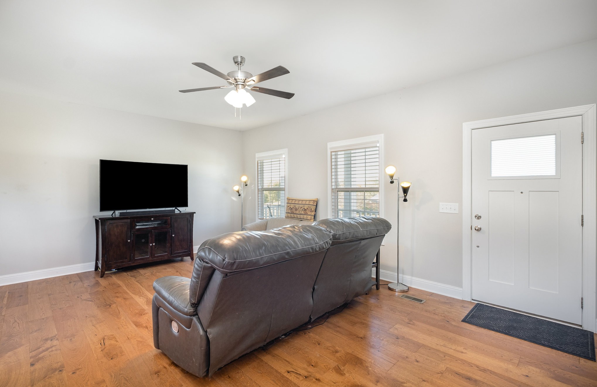 8903 Covington Road White House, TN 37188 - Photo 9 of 36 a living room with furniture and a flat screen tv