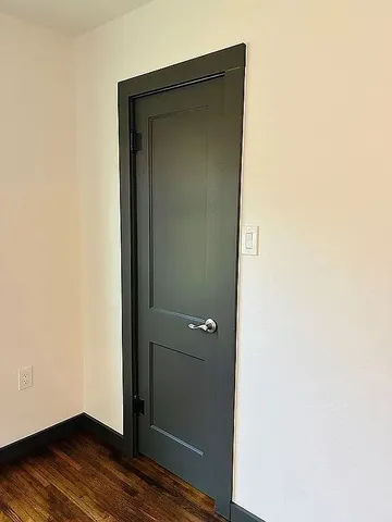 a bathroom with a sink toilet and mirror