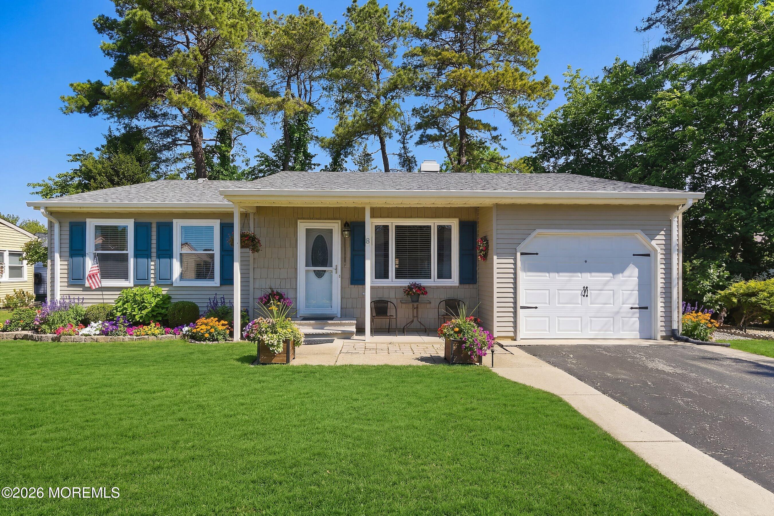8 Hummingbird Lane Whiting, NJ 08759 - Photo 2 of 41 a front view of a house with garden