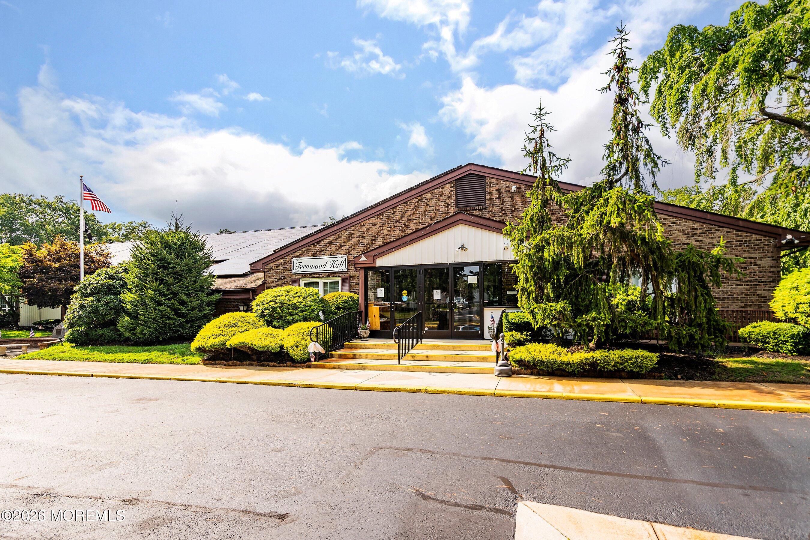 8 Hummingbird Lane Whiting, NJ 08759 - Photo 26 of 41 a front view of house with yard swimming pool and outdoor seating