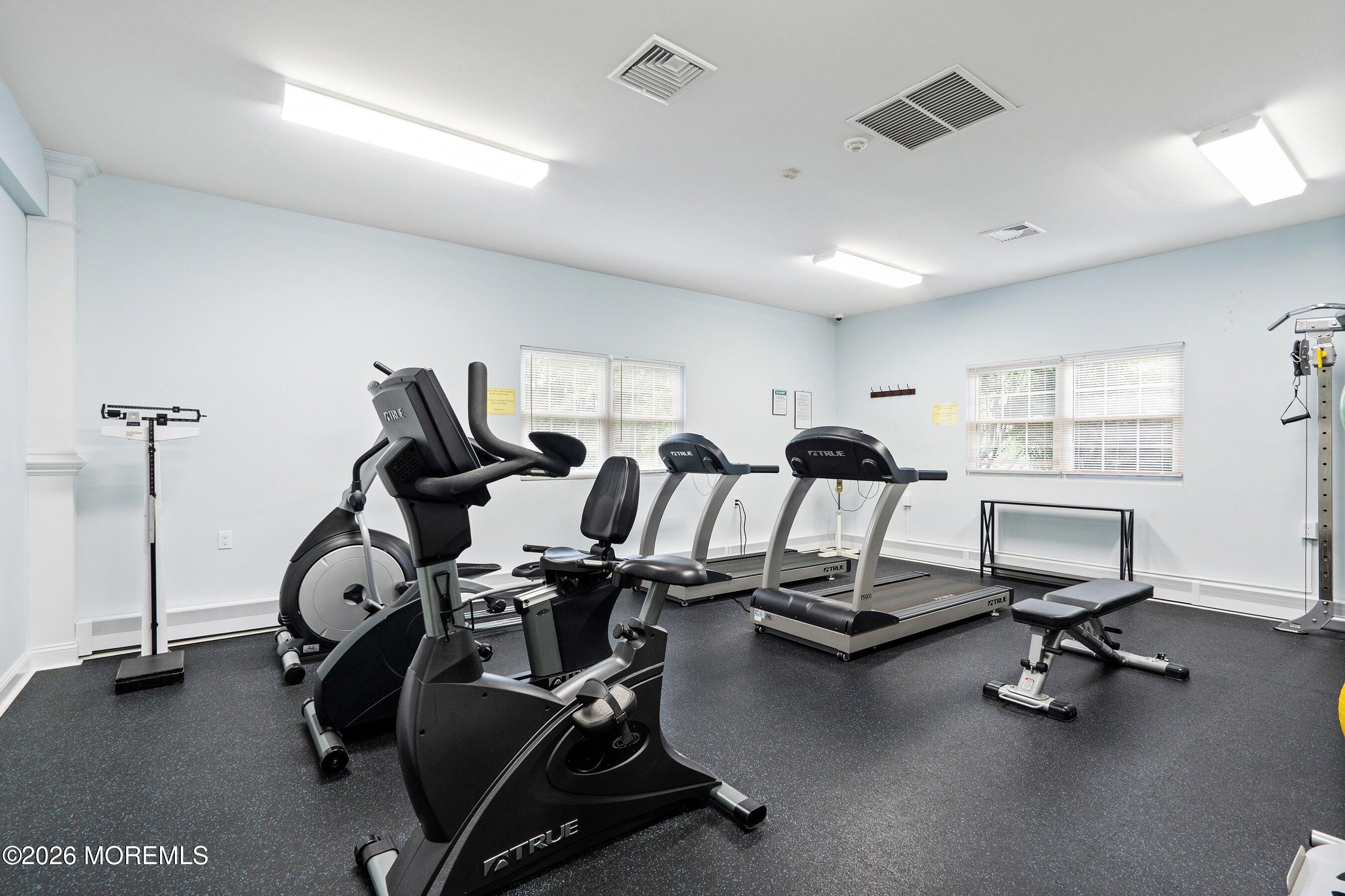 8 Hummingbird Lane Whiting, NJ 08759 - Photo 32 of 41 a view of a room with gym equipment