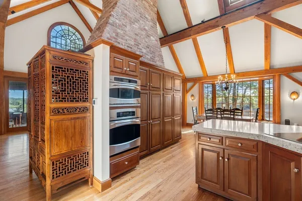 a kitchen with stainless steel appliances a stove and a refrigerator