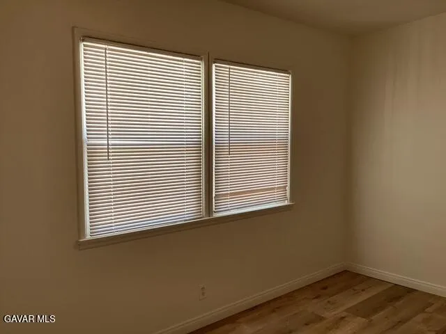 a view of a room that has a window in it