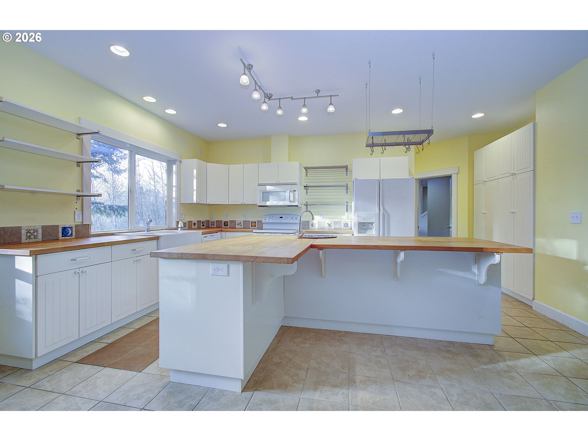 66743 Doetsch Road Deer Island, OR 97054 - Photo 12 of 43 a kitchen with counter top space cabinets and appliances