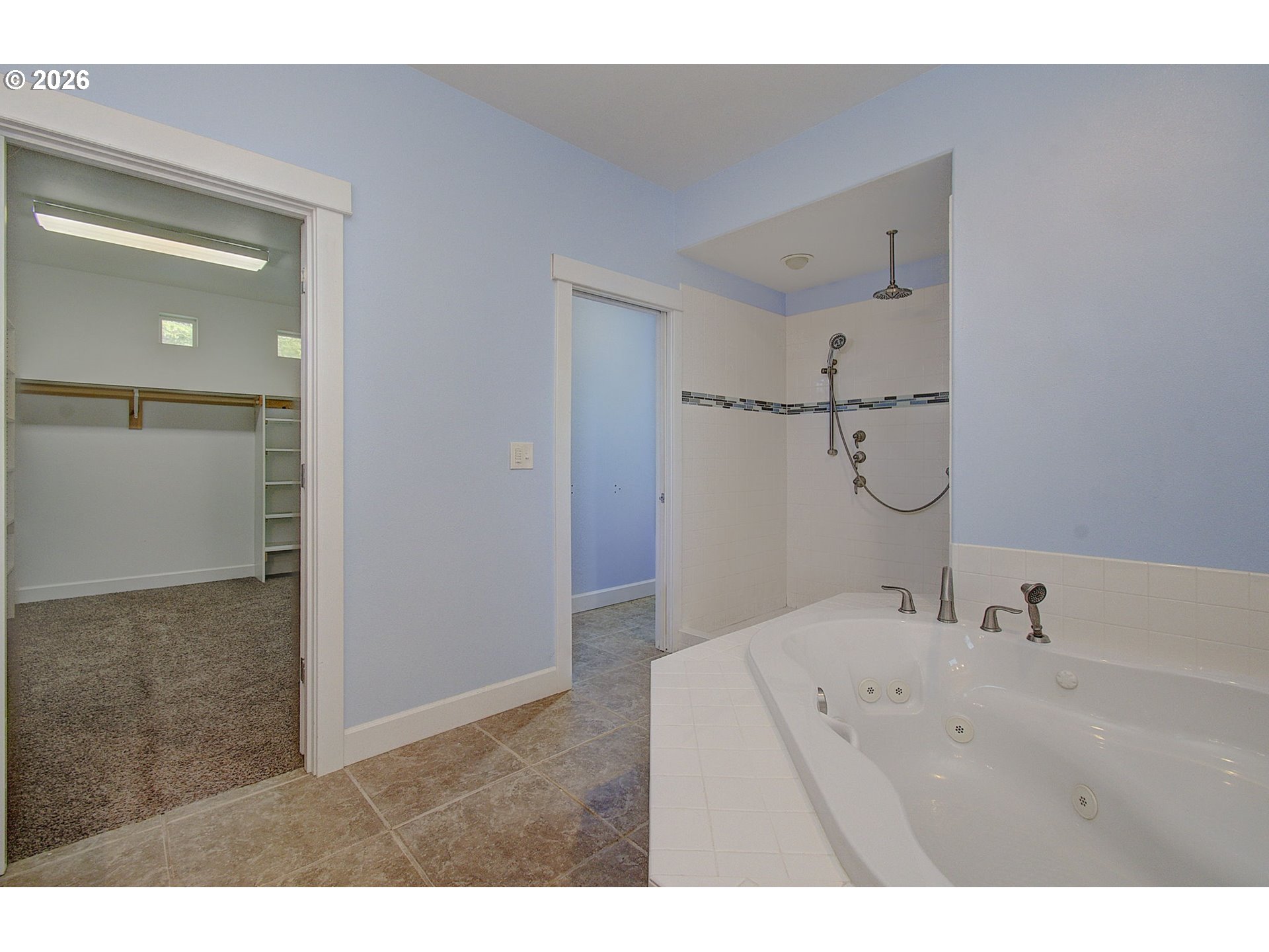 66743 Doetsch Road Deer Island, OR 97054 - Photo 14 of 43 a bathroom with a tub sink and mirror