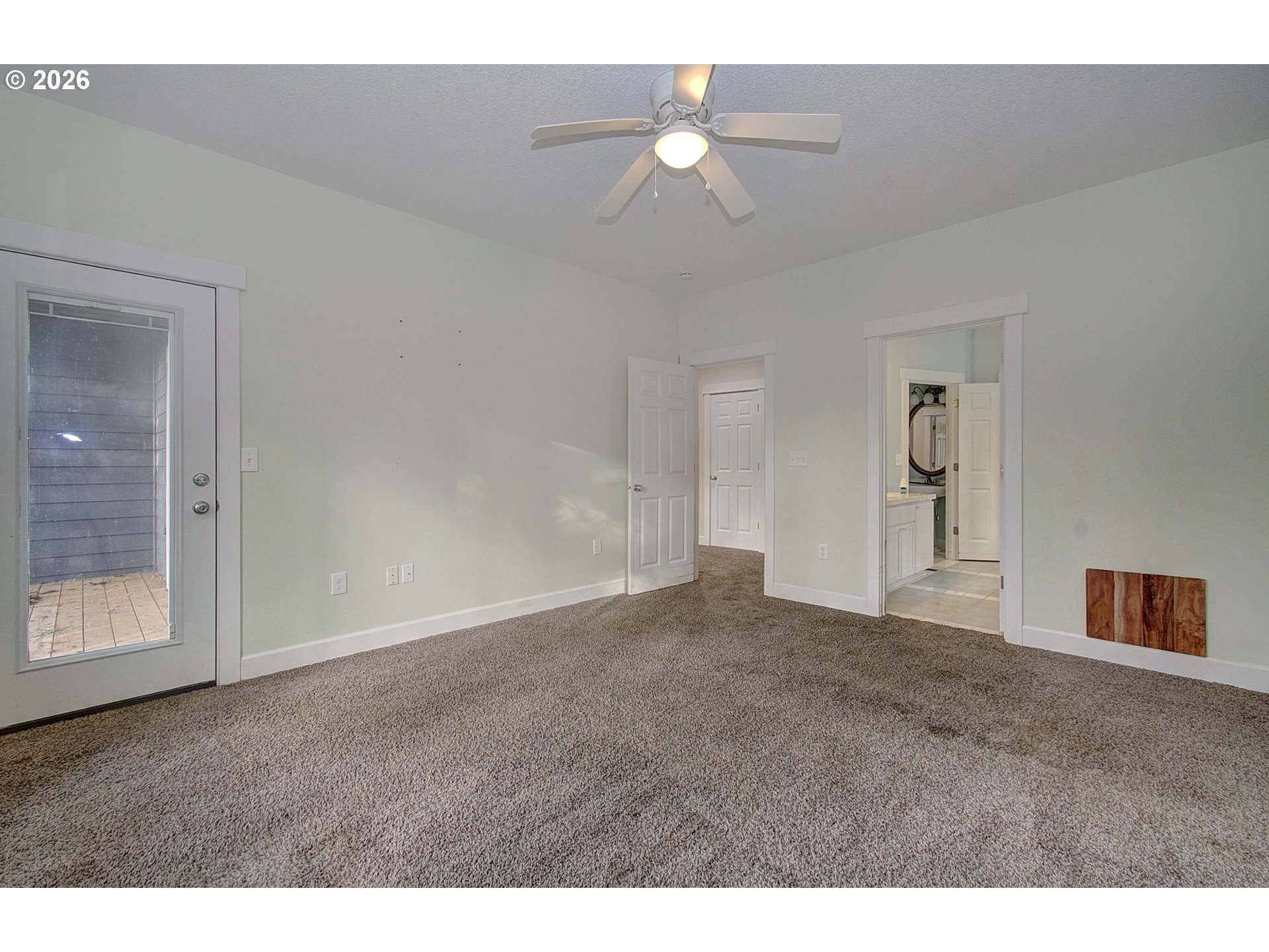 66743 Doetsch Road Deer Island, OR 97054 - Photo 16 of 43 a view of an empty room with a chandelier fan