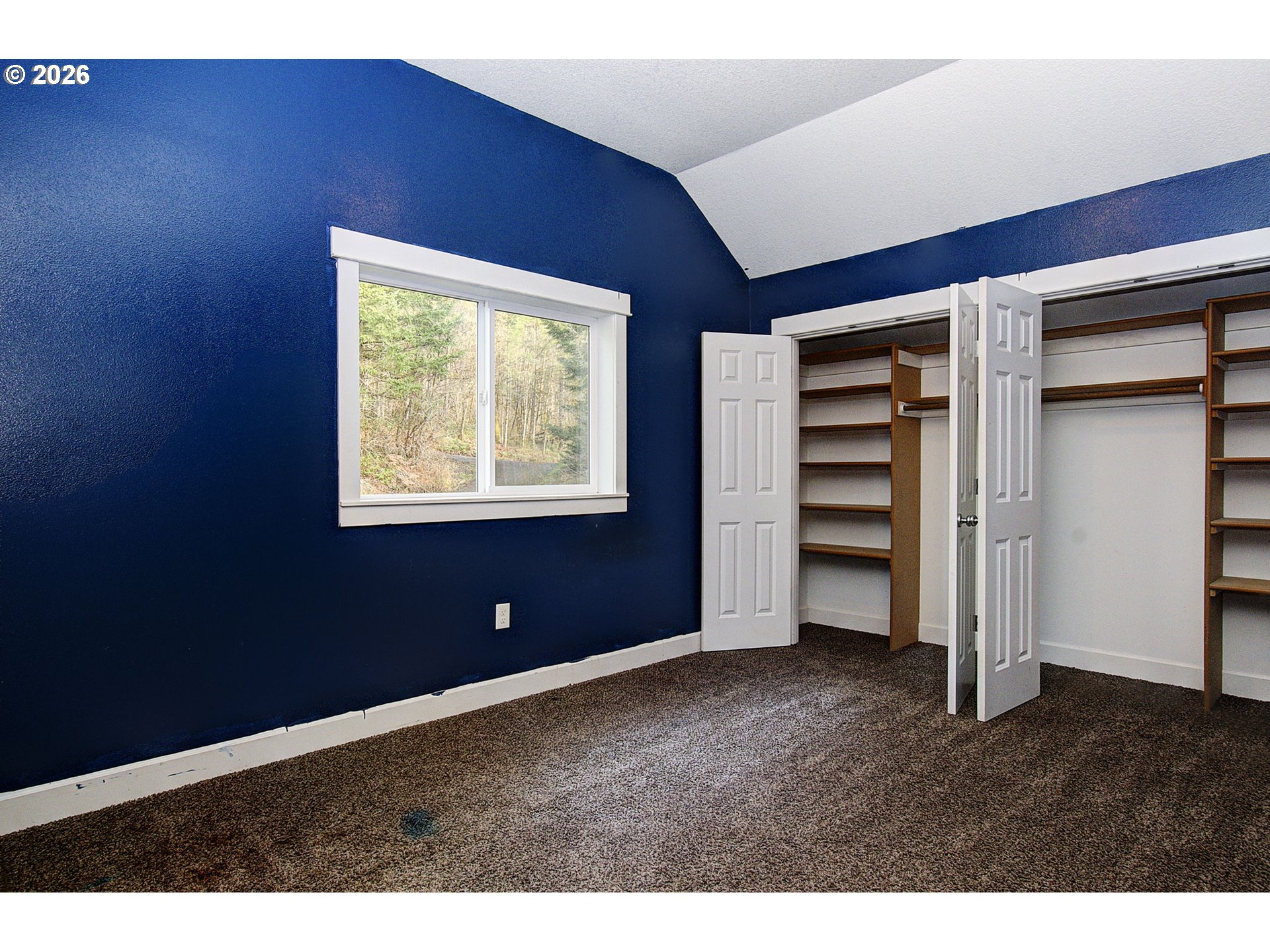 66743 Doetsch Road Deer Island, OR 97054 - Photo 23 of 43 a view of an empty room with a window