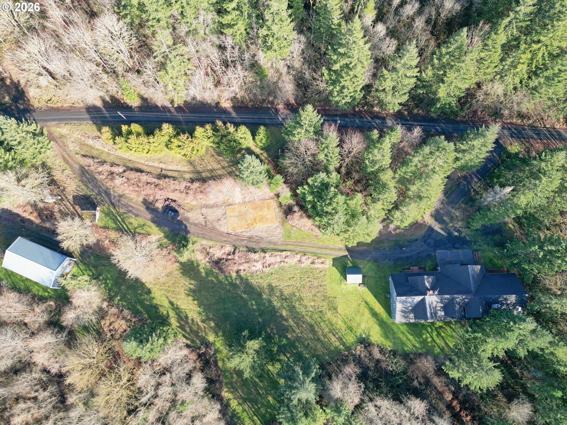 66743 Doetsch Road Deer Island, OR 97054 - Photo 38 of 43 a backyard of a house with a yard and outdoor seating