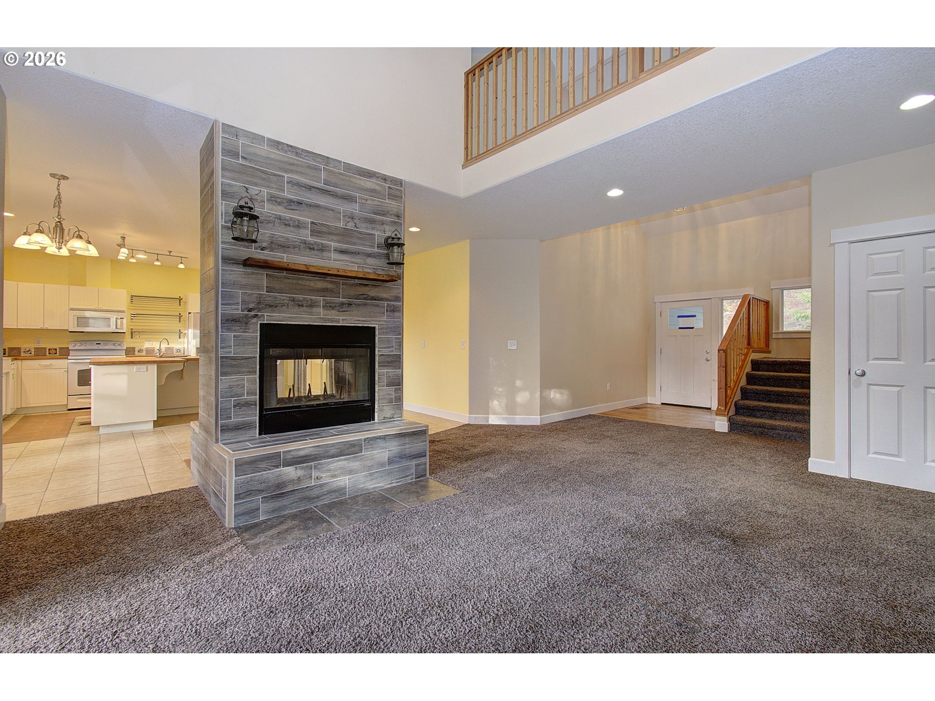 66743 Doetsch Road Deer Island, OR 97054 - Photo 10 of 43 a living room with furniture and a fireplace