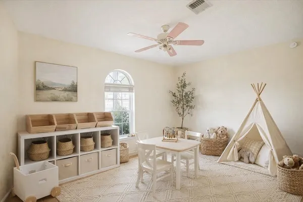 a view of a livingroom with furniture and window