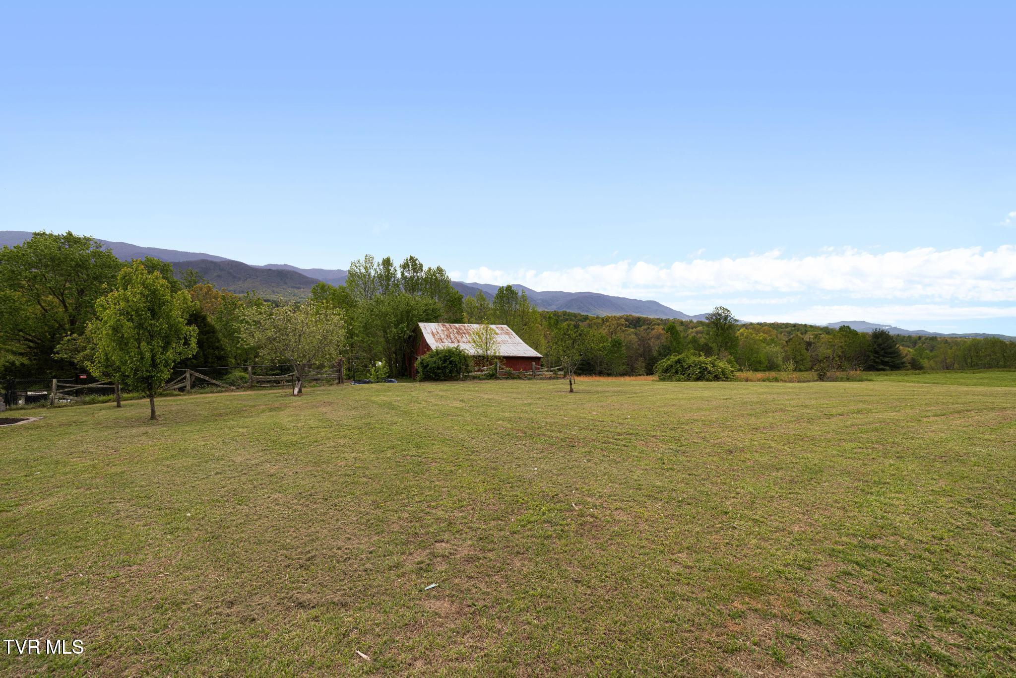 1180 Keller Road Afton, TN 37616 - Photo 59 of 62 Back yard with barn view