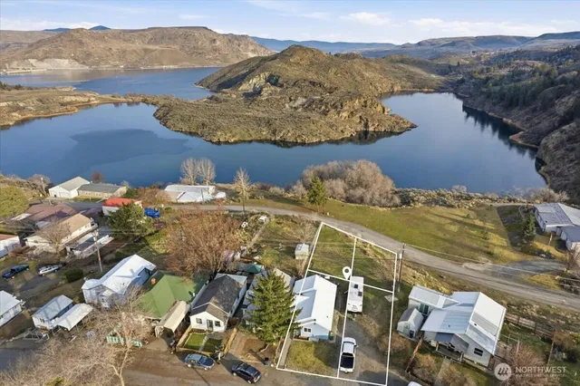 a view of a city with an ocean