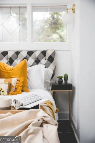 a bathroom with a sink a mirror and a toilet