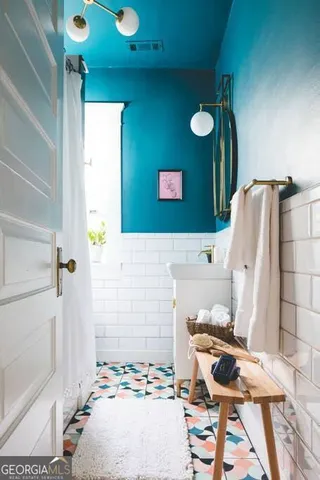 a bed room with a bed and a table