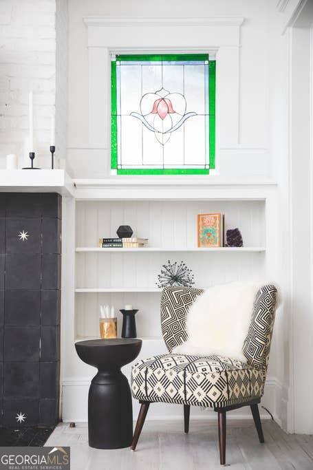 449 Greenwood Avenue Northeast, Unit 1 Atlanta, GA 30308 - Photo 9 of 27 a bedroom with a bed and a window