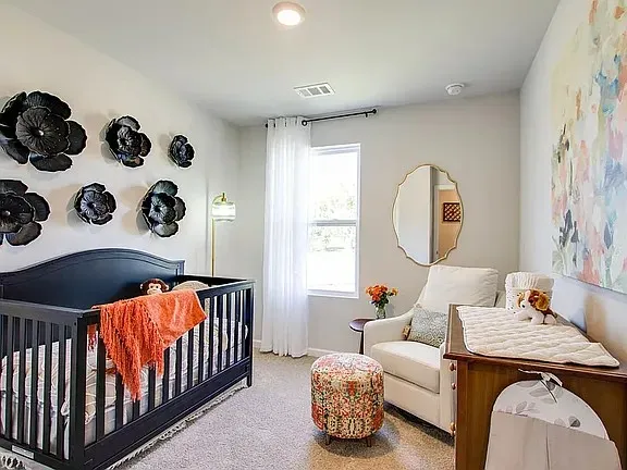 a bed room with furniture and a window