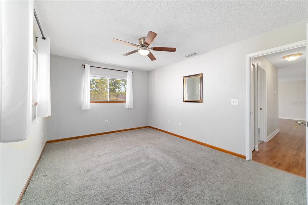 8329 Southwest 105th Place Ocala, FL 34481 - Photo 17 of 39 a view of an empty room with a window