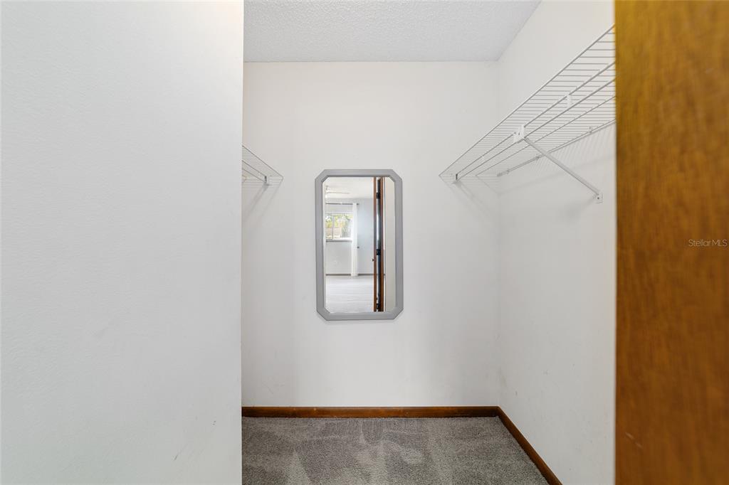 8329 Southwest 105th Place Ocala, FL 34481 - Photo 18 of 39 a view of a small space with wooden floor and a window
