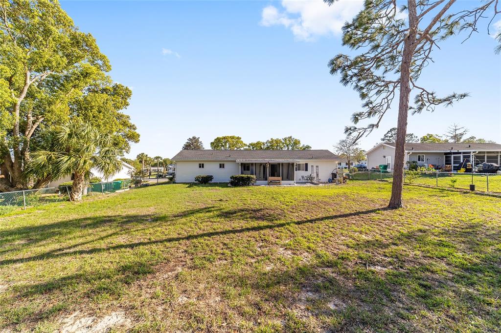 8329 Southwest 105th Place Ocala, FL 34481 - Photo 33 of 39 a view of an house with a swimming pool
