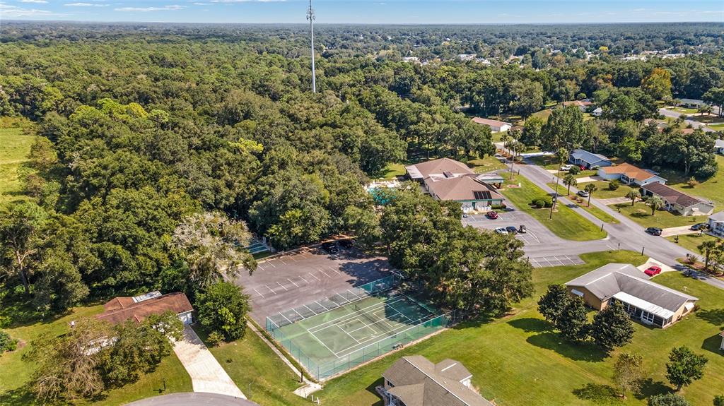 8329 Southwest 105th Place Ocala, FL 34481 - Photo 35 of 39 an aerial view of residential houses with outdoor space