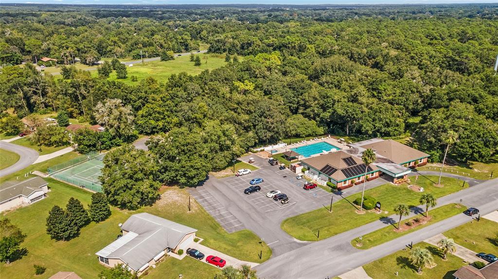 8329 Southwest 105th Place Ocala, FL 34481 - Photo 37 of 39 an aerial view of a house with swimming pool garden and patio