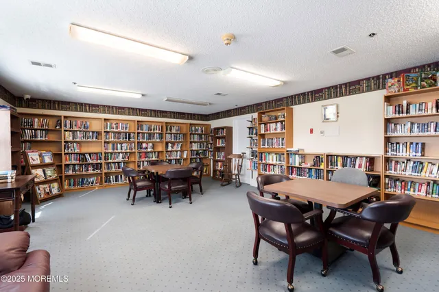 a view of a livingroom with furniture and dining room