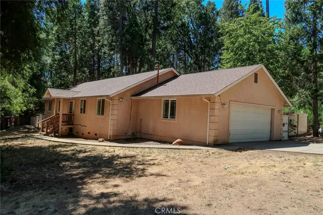 a house with trees in the background