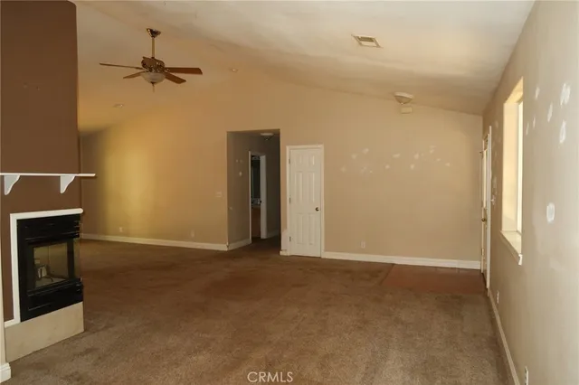 a view of a livingroom with a staircase