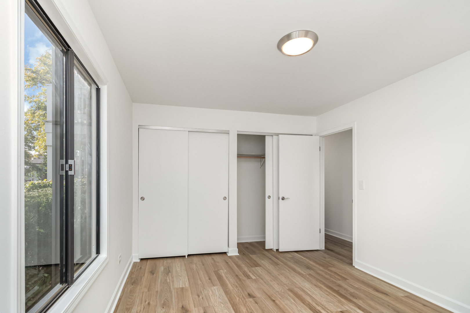 1467 Fairlane Drive, Unit 1B Schaumburg, IL 60193 - Photo 12 of 17 a view of hallway with wooden floor