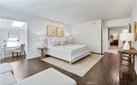 a spacious bathroom with a double vanity sink double and a mirror