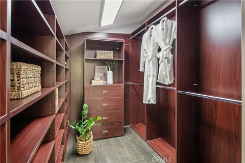 a bedroom with bed and window