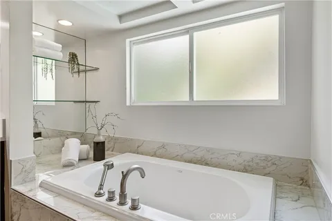 a bathroom with a sink and a vanity