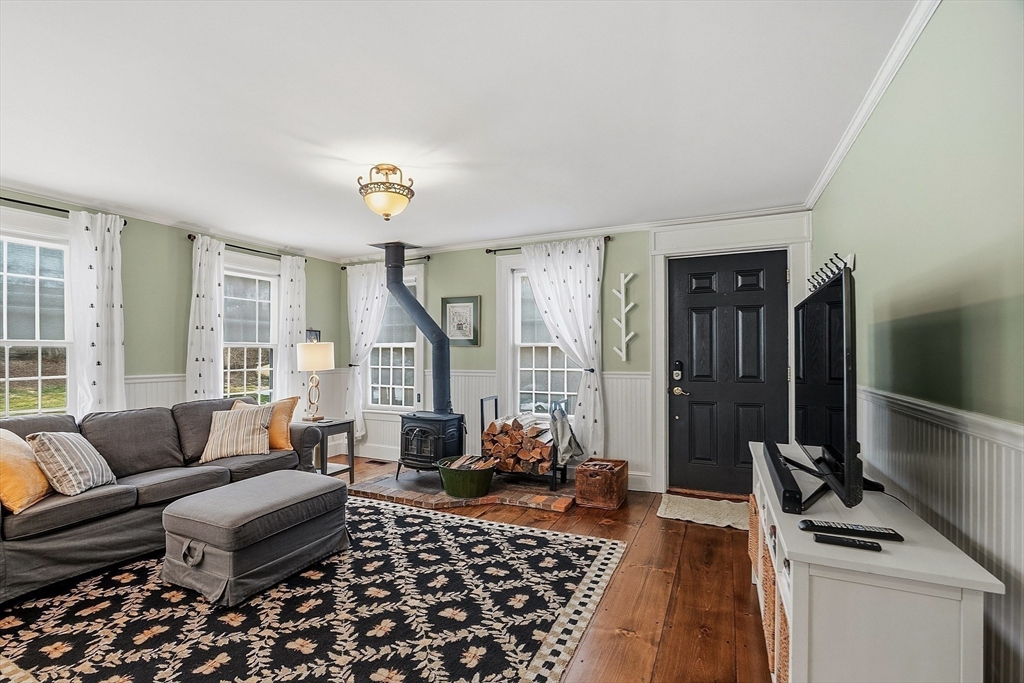 100 Main Street Ashburnham, MA 01430 - Photo 11 of 42 a living room with furniture and a window