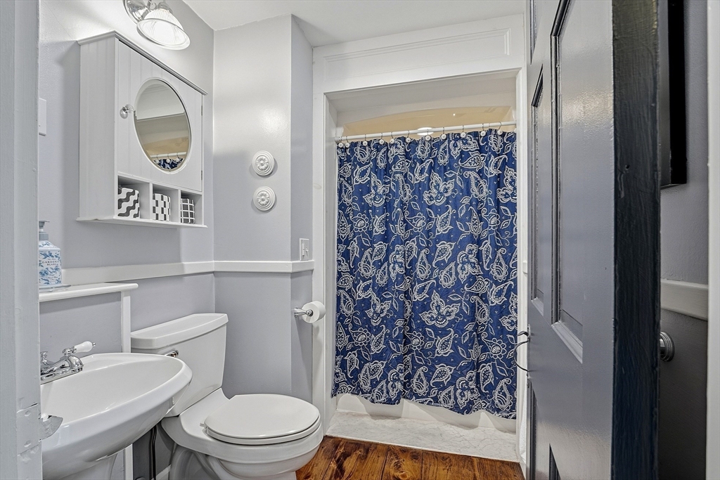 100 Main Street Ashburnham, MA 01430 - Photo 12 of 42 a bathroom with a toilet sink and shower