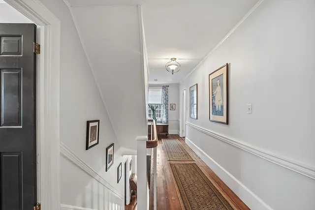 a view of a living room with windows