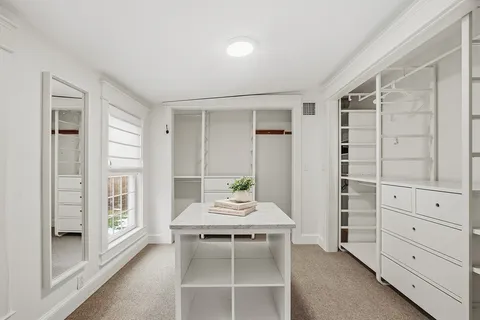 a dining room with a furniture and window