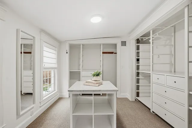 a dining room with a furniture and window