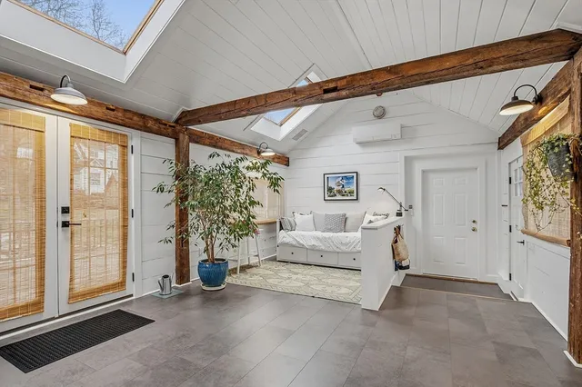 a bed room with a bed and a couch