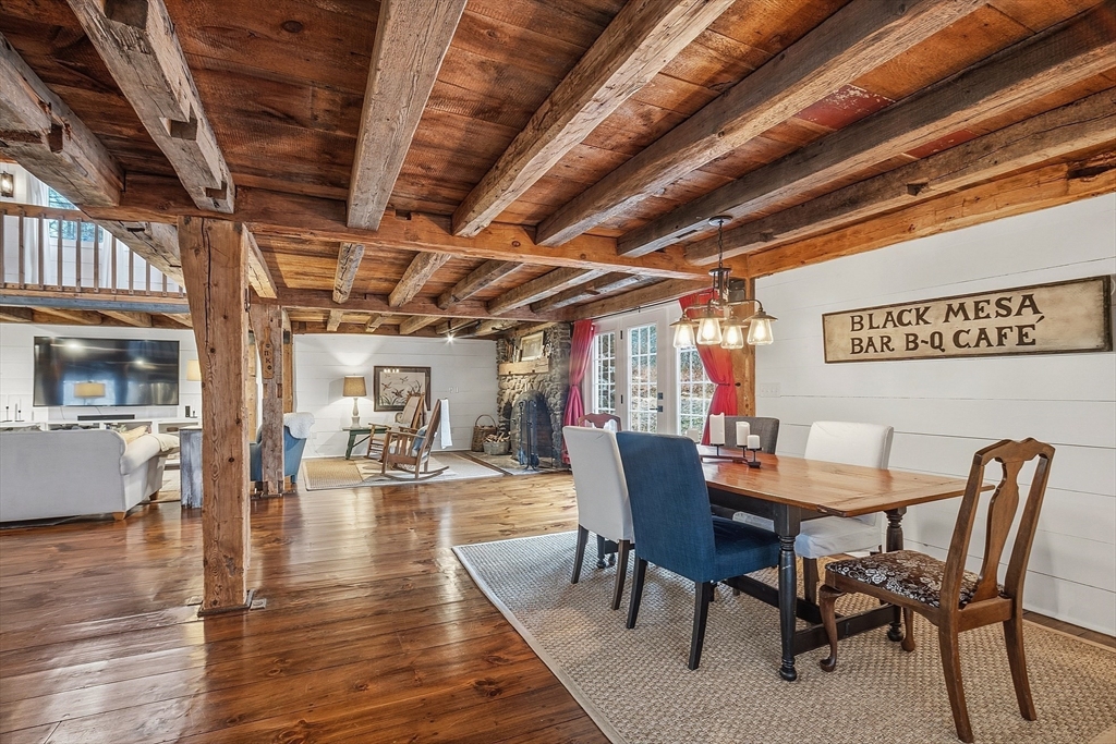 100 Main Street Ashburnham, MA 01430 - Photo 28 of 42 a dining room with furniture wooden floor and a rug
