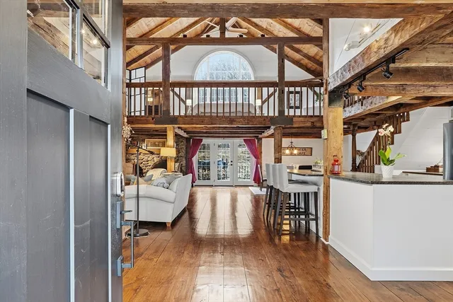 a view of a porch with wooden floor