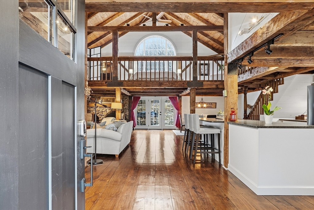 100 Main Street Ashburnham, MA 01430 - Photo 42 of 42 a view of a porch with wooden floor