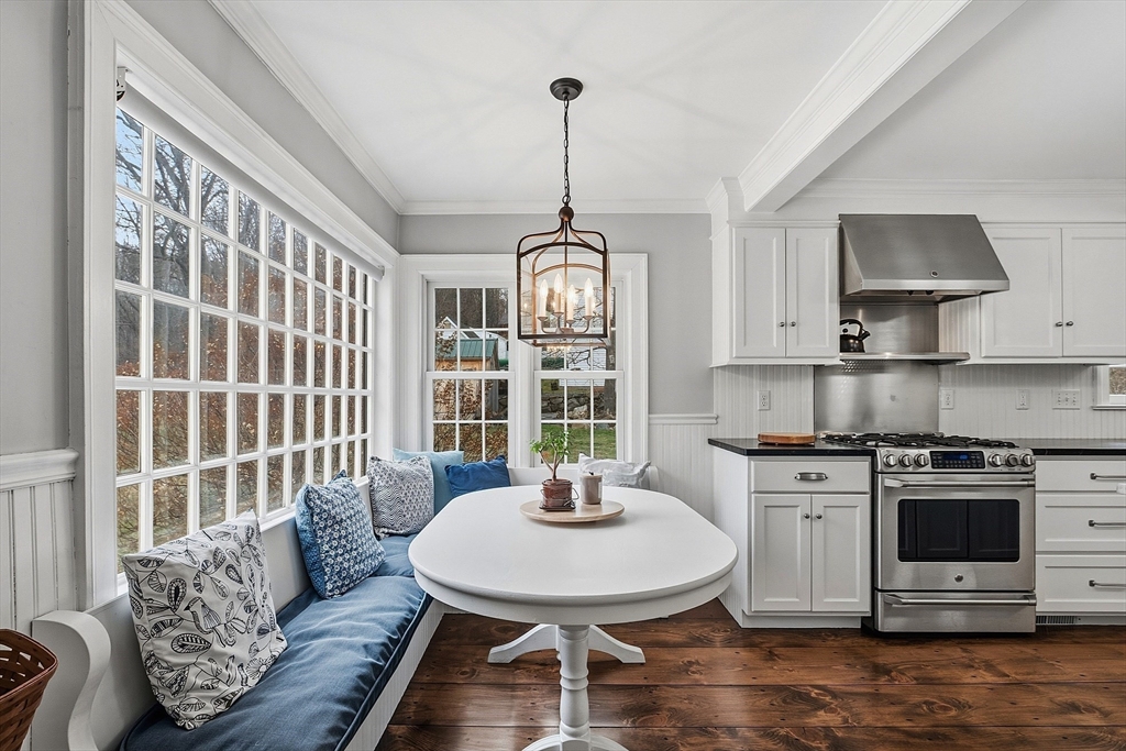 100 Main Street Ashburnham, MA 01430 - Photo 9 of 42 a living room with furniture and a wooden floor