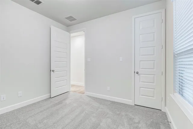 an empty room with closet