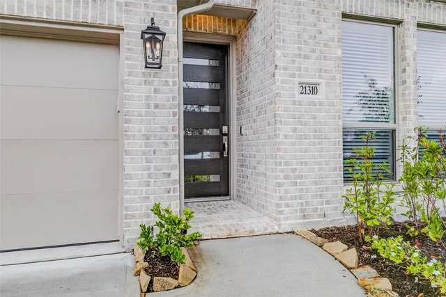 a potted plant on a brick building