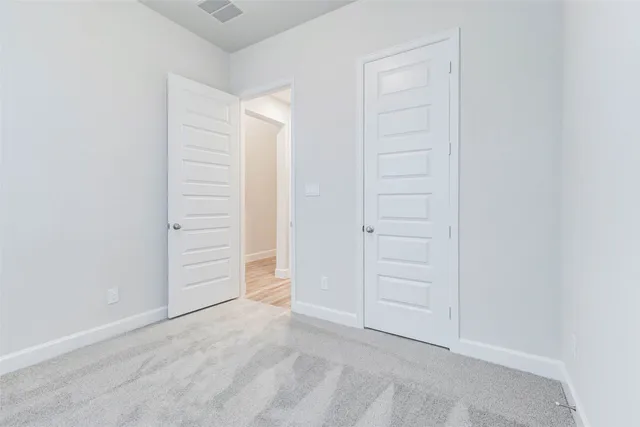 an empty room with closet