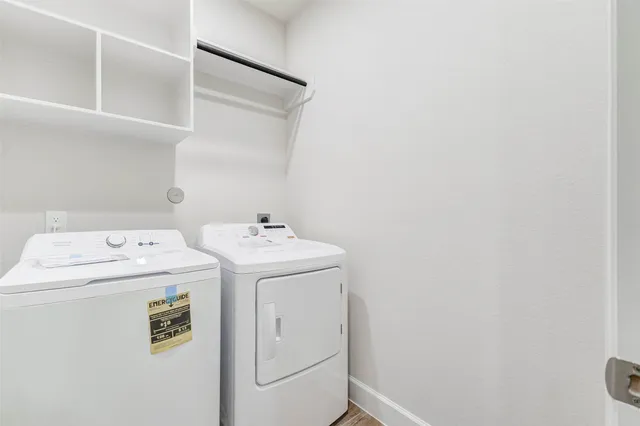 a utility room with dryer and washer