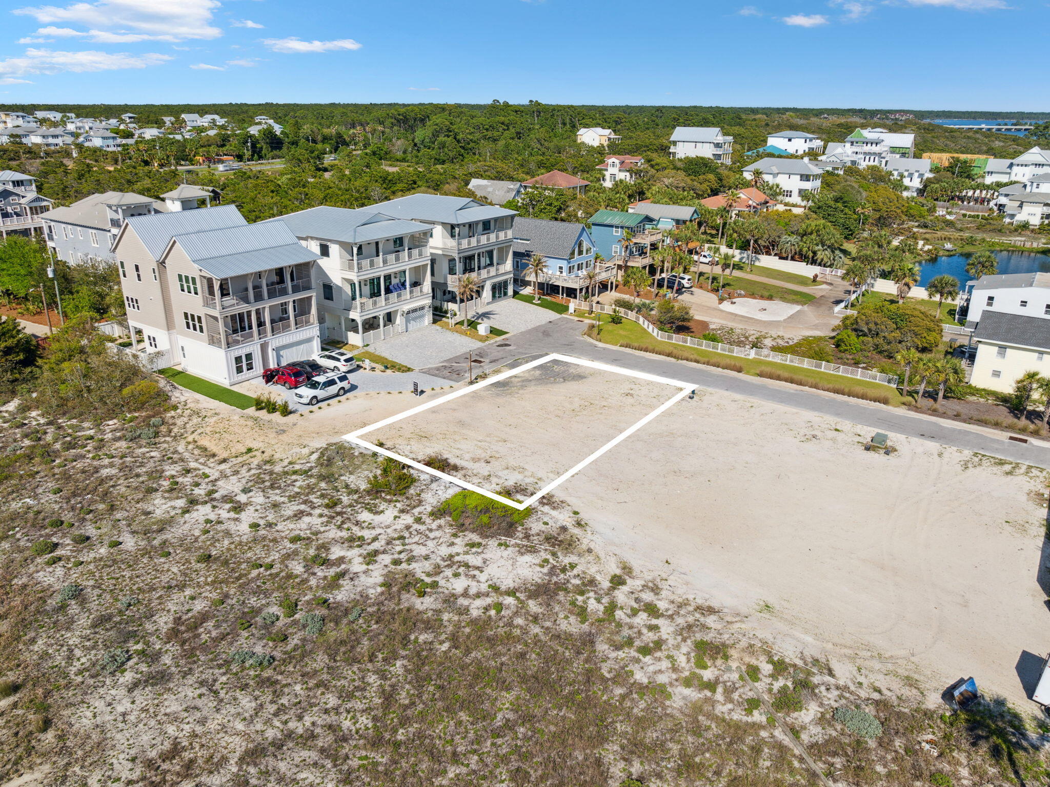 1-2 3 Jan Ln Inlet Beach Inlet Beach, FL 32461 - Photo 42 of 70 an aerial view of residential houses with outdoor space and swimming pool