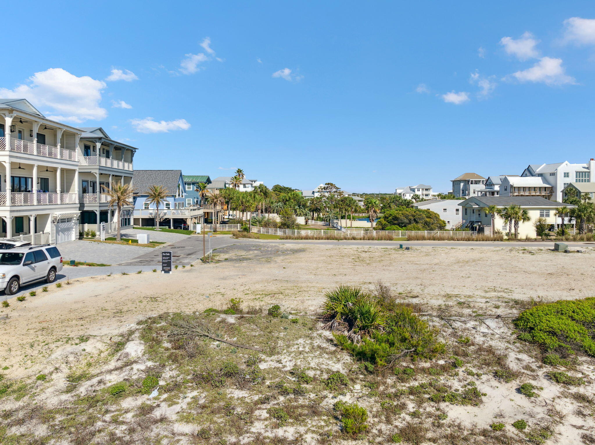 1-2 3 Jan Ln Inlet Beach Inlet Beach, FL 32461 - Photo 54 of 70 a view of a lake with building and car parked
