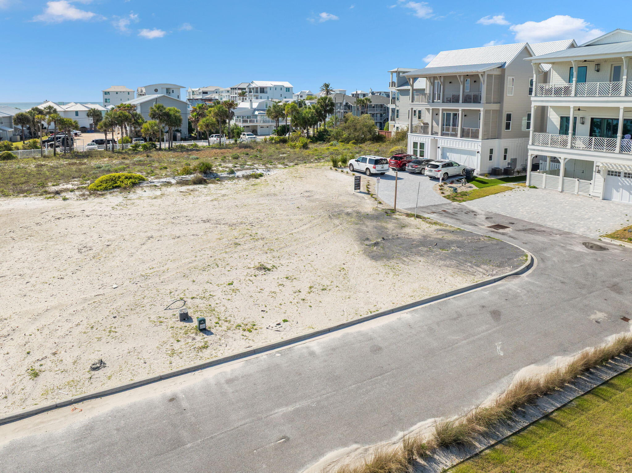 1-2 3 Jan Ln Inlet Beach Inlet Beach, FL 32461 - Photo 59 of 70 a view of swimming pool with lawn chairs and potted plants